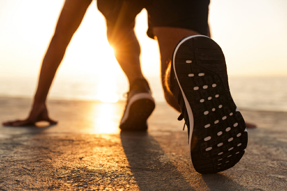 Man Running on Beach